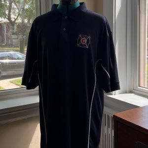 PGA tour navy blue mens golf shirt with Chicago Fire soccer logo on front. XL